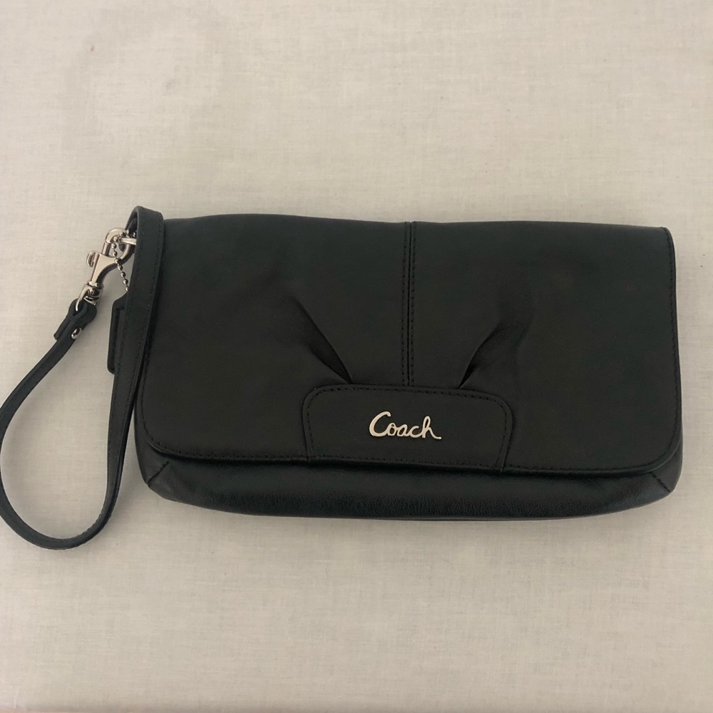 Gently used black coach clutch wristlet